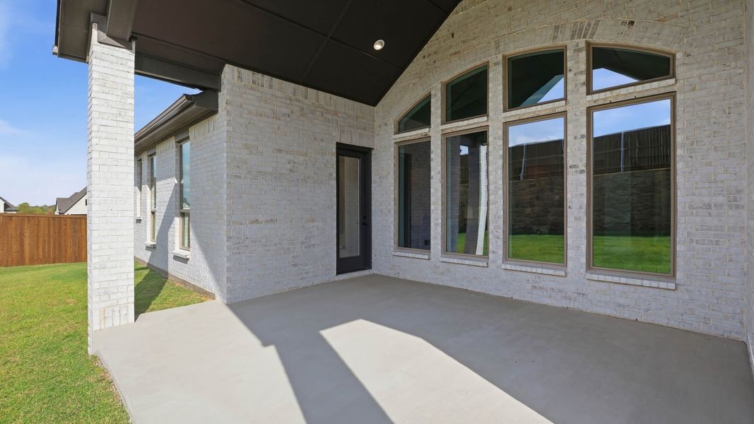 Exterior details and patio area of a home in Sweetgrass, Haslet (Image 4).