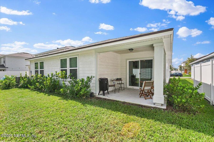 Front exterior of a new home in Wells Landing, Jacksonville, FL, highlighting curb appeal (Image 18). Front exterior of a new home in Wells Landing, Jacksonville, FL, highlighting curb appeal (Image 18).