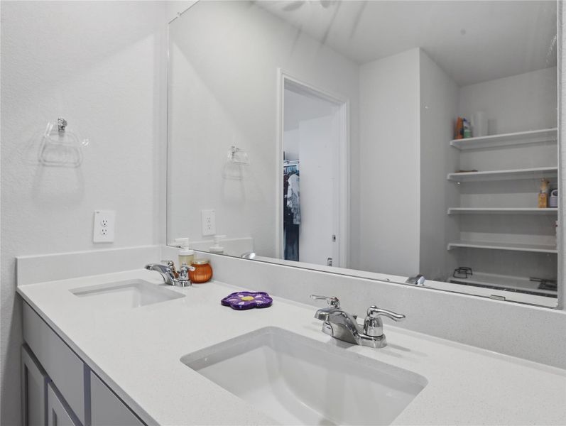 Clean lines and a spacious dual vanity define this updated bathroom. Clean lines and a spacious dual vanity define this updated bathroom.
