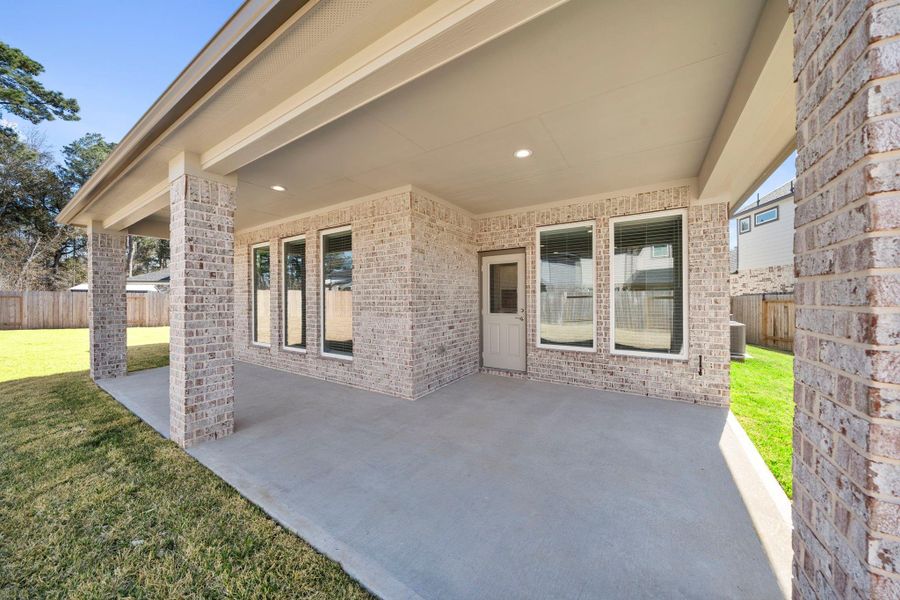 Exterior details and patio area of a home in Barton Creek Ranch, Conroe (Image 4). Exterior details and patio area of a home in Barton Creek Ranch, Conroe (Image 4).