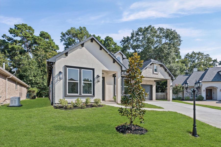 Front exterior of a new home in , Montgomery, TX, highlighting curb appeal (Image 2). Front exterior of a new home in , Montgomery, TX, highlighting curb appeal (Image 2).