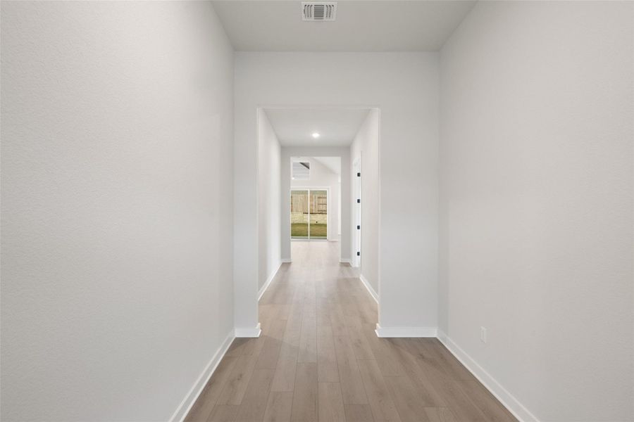 Spacious, unfurnished interior of a new home in Lariat, Liberty Hill (Image 32). Spacious, unfurnished interior of a new home in Lariat, Liberty Hill (Image 32).