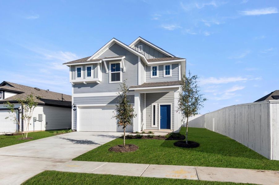 Front exterior of a new home in Harvest Ridge, Elgin, TX, highlighting curb appeal (Image 1). Front exterior of a new home in Harvest Ridge, Elgin, TX, highlighting curb appeal (Image 1).