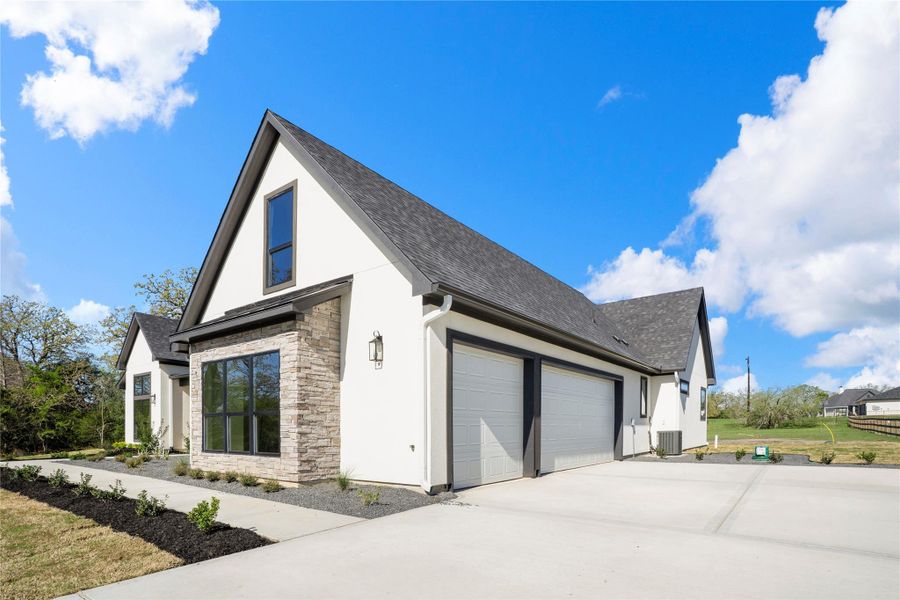 Front exterior of a new home in , Bryan, TX, highlighting curb appeal (Image 2). Front exterior of a new home in , Bryan, TX, highlighting curb appeal (Image 2).