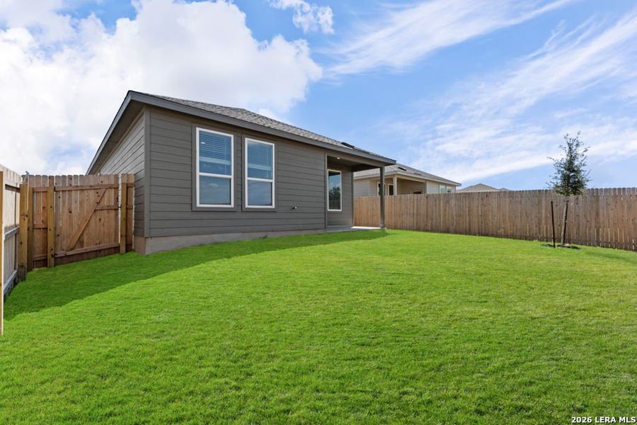Exterior details and patio area of a home in Juniper Ranch, Spring Branch (Image 3).