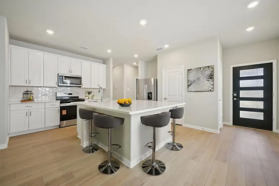 Photo is not of the actual home, but is an inspirational photo of builder’s model home and may depict options, furnishings, and/or decorator features that are not included.