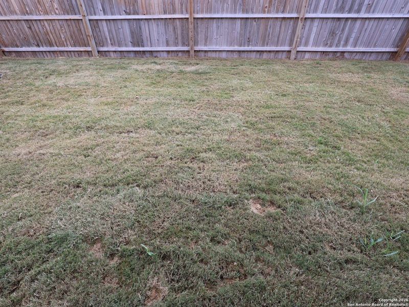 Exterior details and patio area of a home in Winding Brook, San Antonio (Image 20).