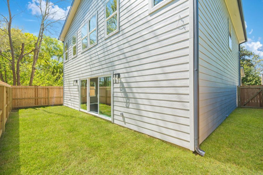 Exterior details and patio area of a home in , Houston (Image 4).