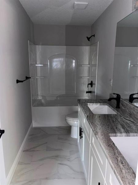 Furnished interior view inside a new home in , Dunnellon (Image 11).