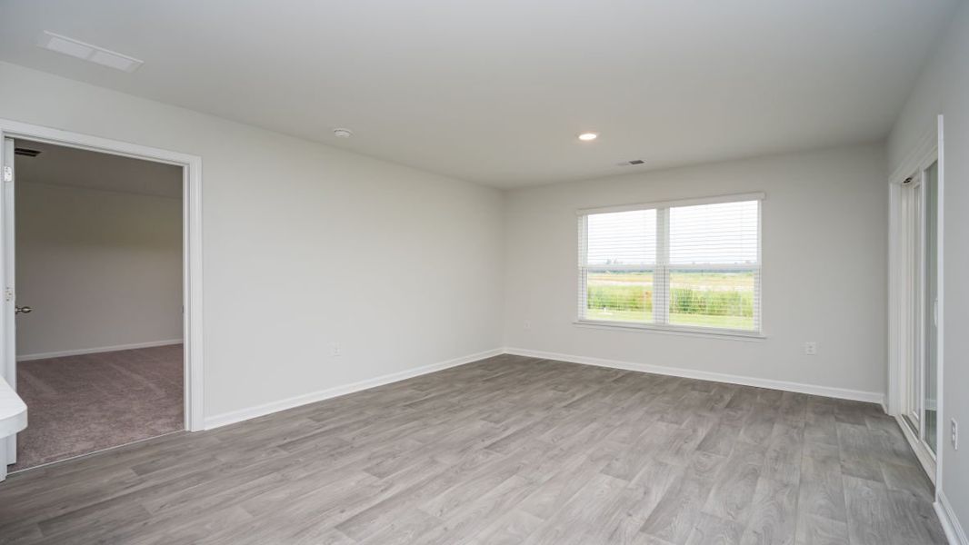 Representative unfurnished interior of a home built from the ARIA by D.R. Horton in The Meadows at Wildwood Village, Shallotte (Image 20). Representative unfurnished interior of a home built from the ARIA by D.R. Horton in The Meadows at Wildwood Village, Shallotte (Image 20).