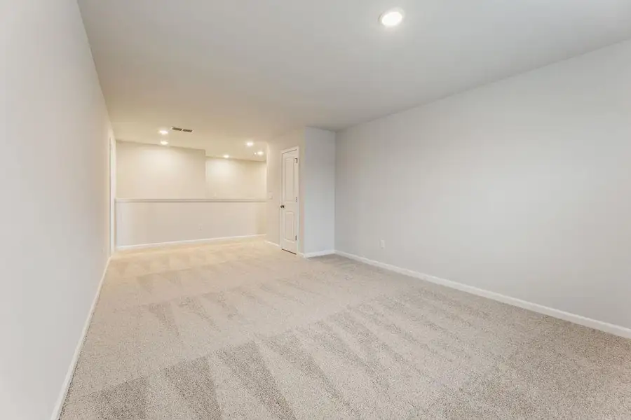 Spacious, unfurnished interior of a new home in Belleview Manor, Fairburn (Image 29).