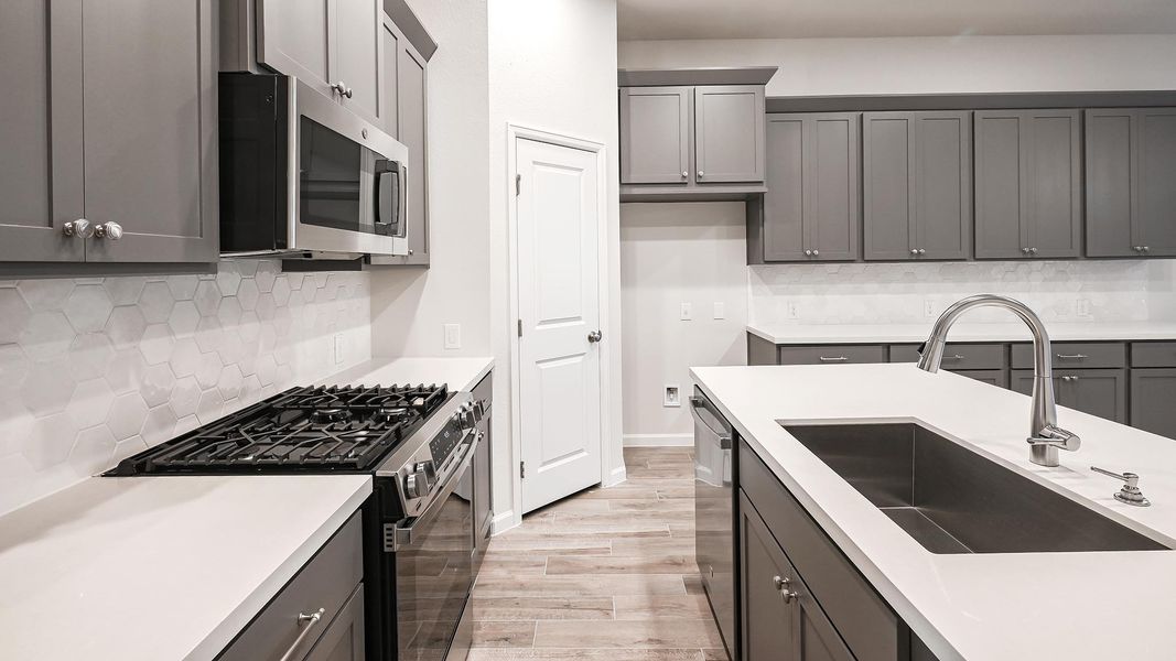 Furnished interior view inside a new home in Crosswinds 40', Kyle (Image 9).