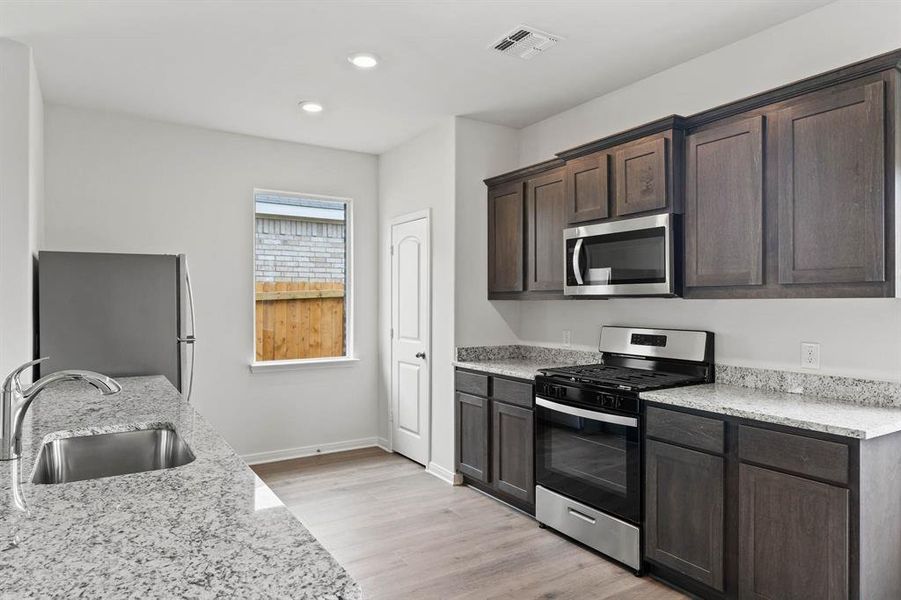Furnished interior view inside a new home in Cresson Estates, Cresson (Image 5).