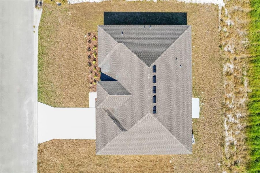 Exterior details and patio area of a home in Grand Oaks, Avon Park (Image 3).