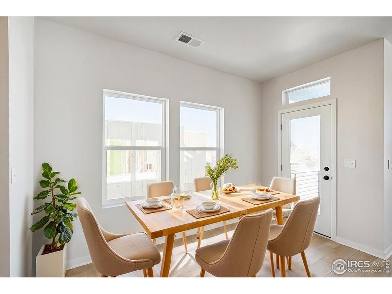 Furnished interior view inside a new home in Kinston Mainstreet Townhomes, Loveland (Image 5).