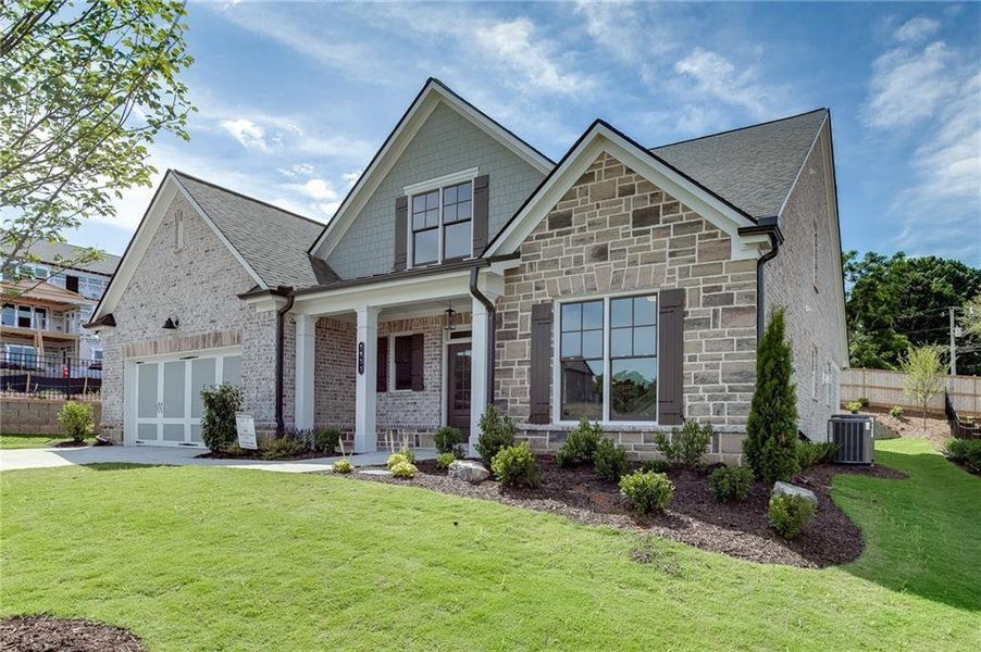 Front exterior of a new home in , Buford, GA, highlighting curb appeal (Image 24). Front exterior of a new home in , Buford, GA, highlighting curb appeal (Image 24).