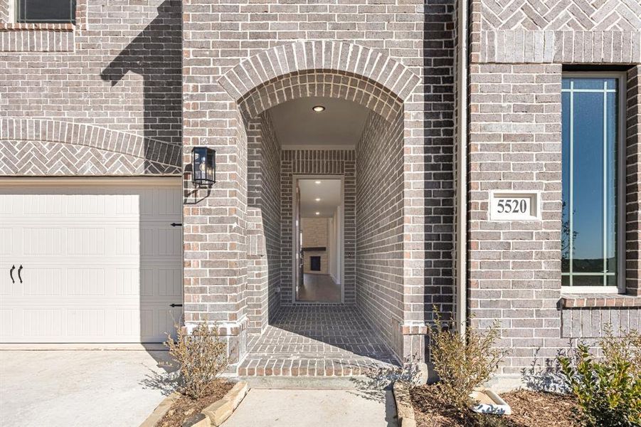 Exterior details and patio area of a home in Country Lakes, Denton (Image 4).