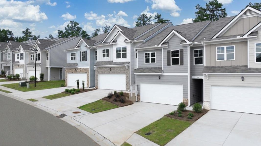 Front exterior of a new home in Mountain Park, Dahlonega, GA, highlighting curb appeal (Image 2). Front exterior of a new home in Mountain Park, Dahlonega, GA, highlighting curb appeal (Image 2).