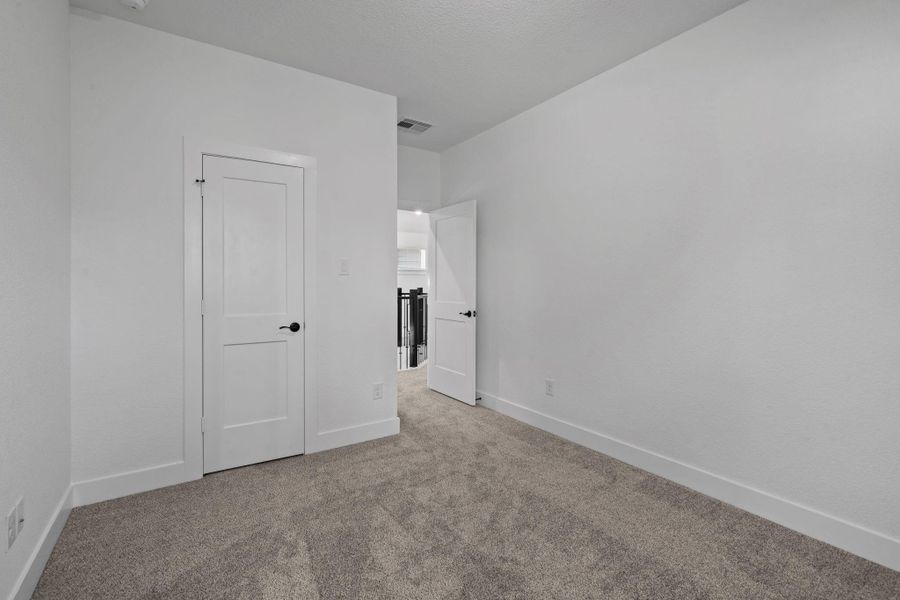 Spacious, unfurnished interior of a new home in The Woodlands Hills, Willis (Image 23).
