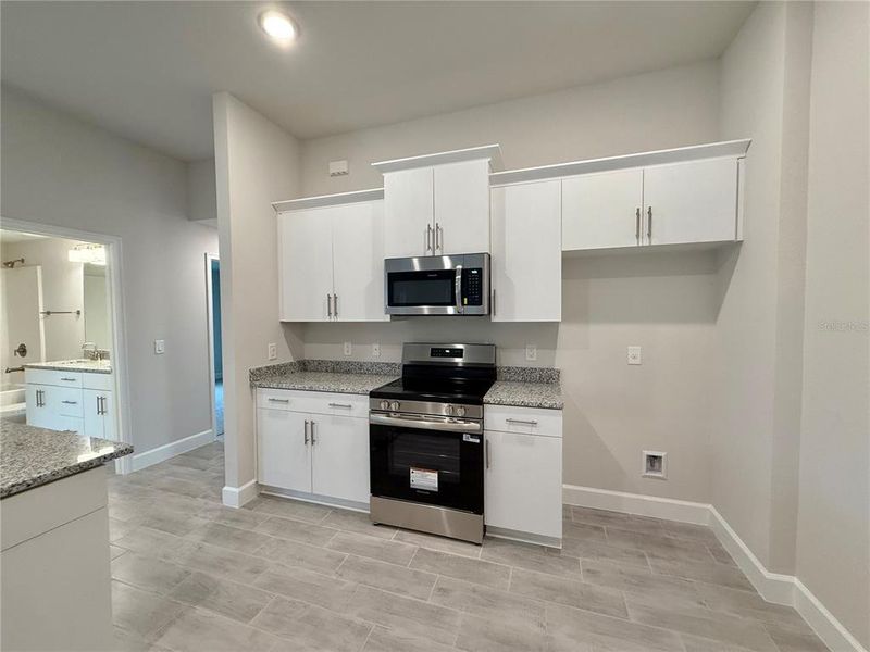 Furnished interior view inside a new home in South Gulf Cove, Port Charlotte (Image 8).