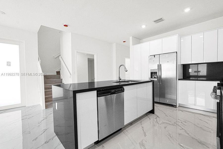 Furnished interior view inside a new home in , Miami (Image 41).