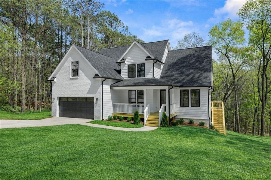 Front exterior of a new home in , Lula, GA, highlighting curb appeal (Image 19). Front exterior of a new home in , Lula, GA, highlighting curb appeal (Image 19).
