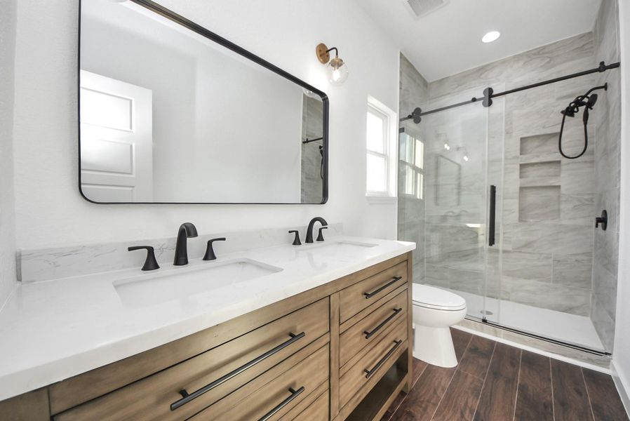 Furnished interior view inside a new home in , Conroe (Image 13).