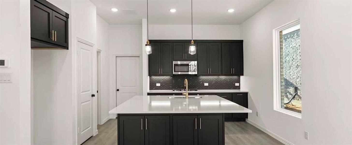 Kitchen featuring the Noir Collection