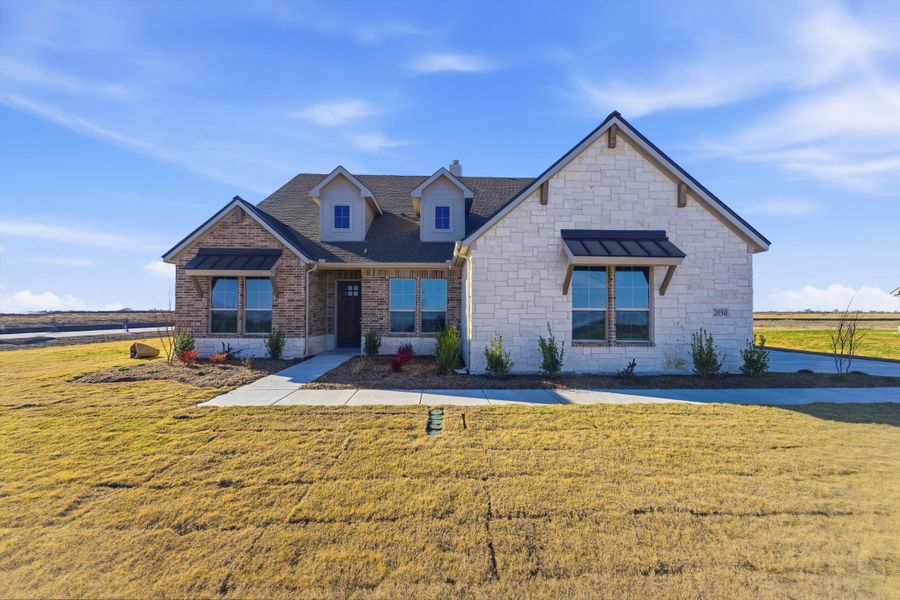 Front exterior of a new home in Clear Sky Addition, Valley View, TX, highlighting curb appeal (Image 26).