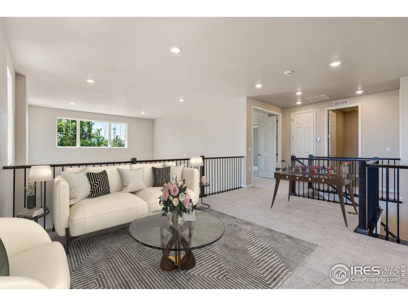 Image Virtually Staged. Loft space for entertaining, game room, office space