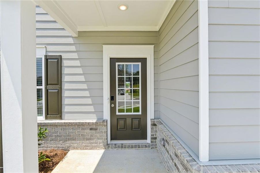 Exterior details and patio area of a home in Preserve at Mountain Creek, Pendergrass (Image 4).