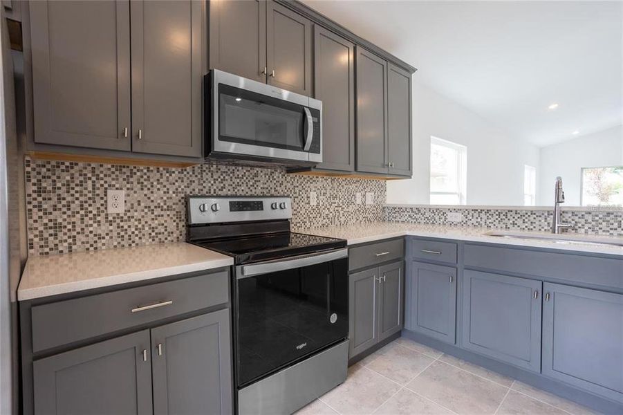 Furnished interior view inside a new home in , Port Charlotte (Image 13). Furnished interior view inside a new home in , Port Charlotte (Image 13).