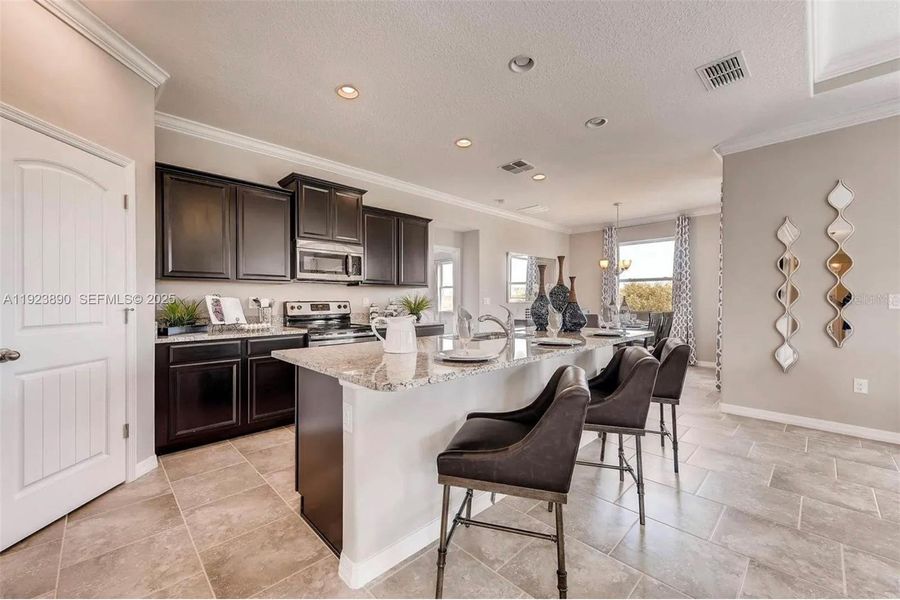 Furnished interior view inside a new home in Kindred, Kissimmee (Image 17).