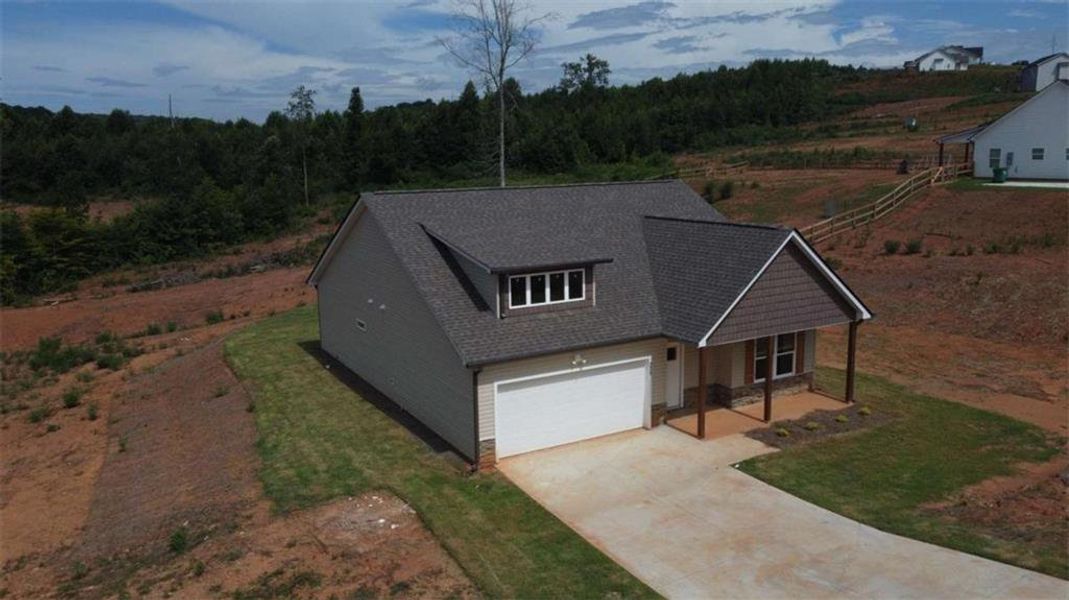 Front exterior of a new home in , Eastanollee, GA, highlighting curb appeal (Image 15). Front exterior of a new home in , Eastanollee, GA, highlighting curb appeal (Image 15).