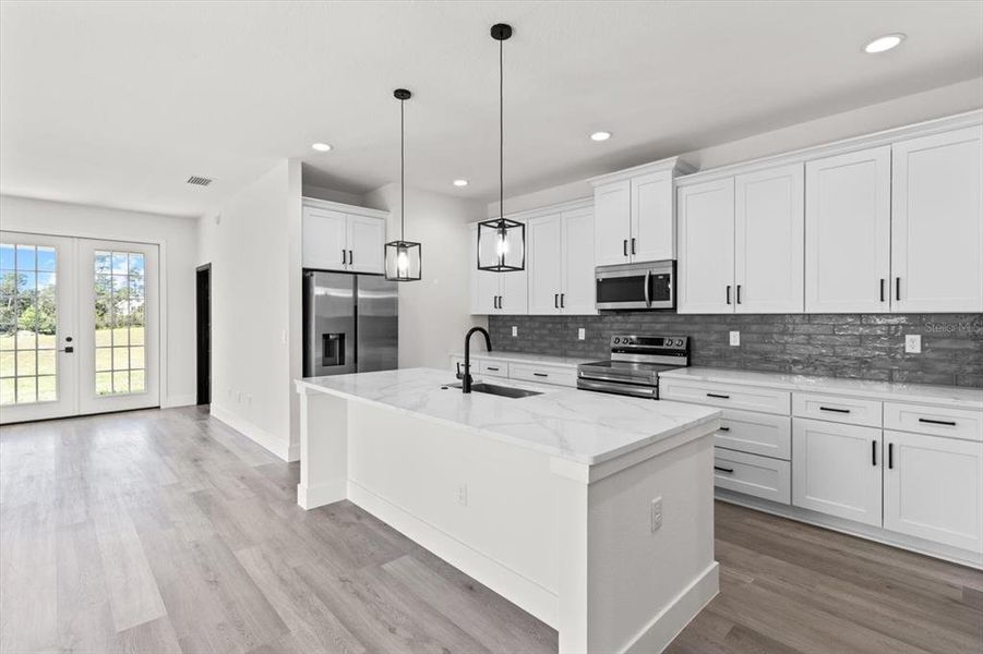 Furnished interior view inside a new home in , Ocala (Image 5). Furnished interior view inside a new home in , Ocala (Image 5).