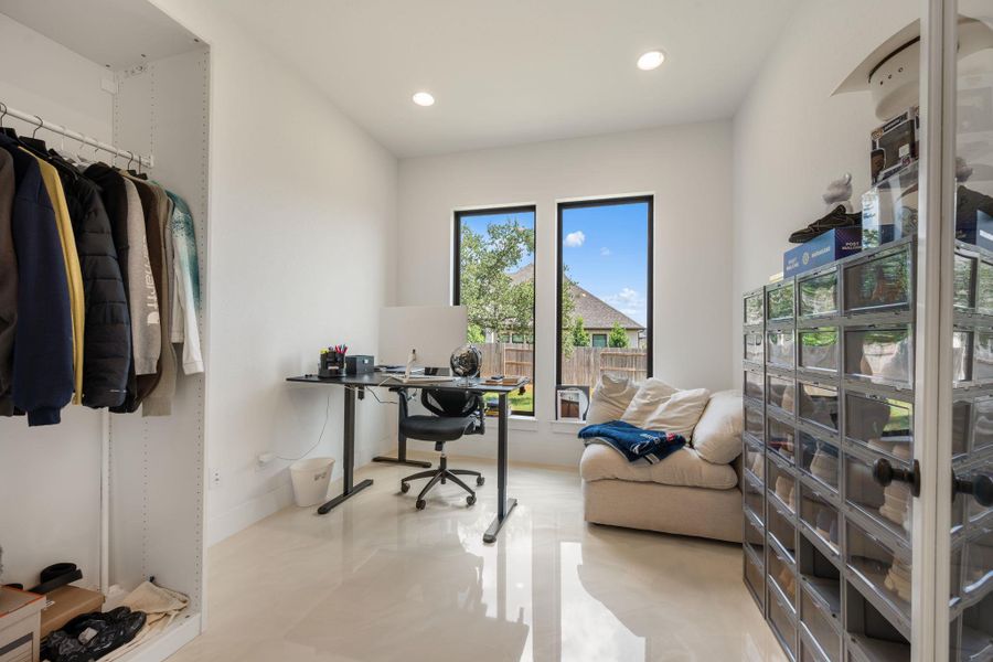 Sun-filled room offers versatile space for an office or additional living area, boasting abundant natural light. Sun-filled room offers versatile space for an office or additional living area, boasting abundant natural light.