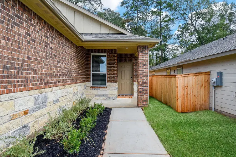 Exterior details and patio area of a home in Montgomery Oaks - Premier, Conroe (Image 3). Exterior details and patio area of a home in Montgomery Oaks - Premier, Conroe (Image 3).