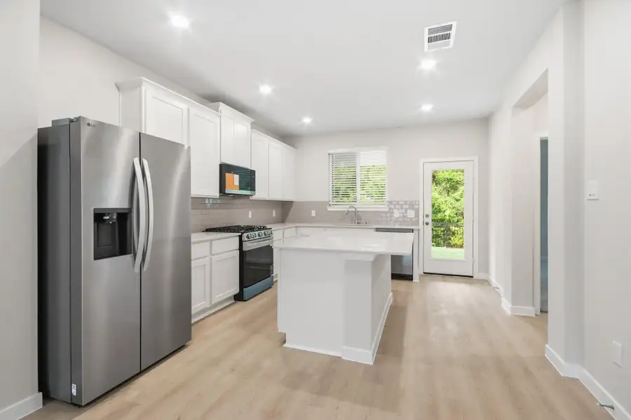 Furnished interior view inside a new home in Audubon, Magnolia (Image 7).