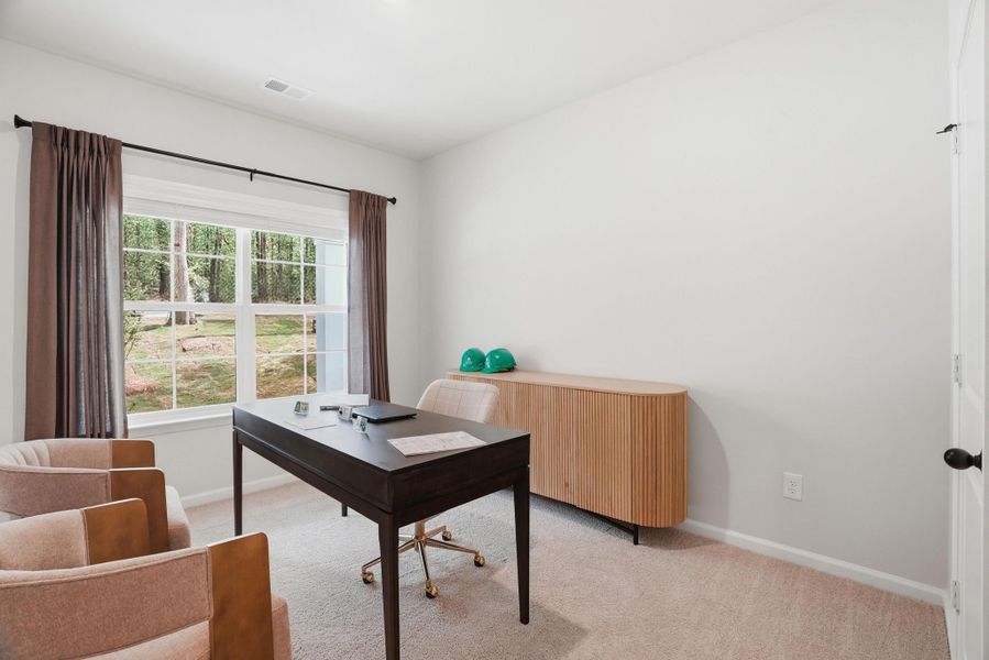 Representative furnished interior of a home built from the Myrtle Select M by McGuinn Homes in Broadway Lake, Anderson (Image 6).