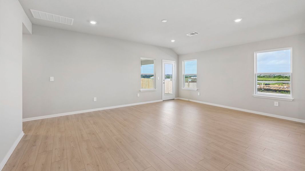 Spacious, unfurnished interior of a new home in Carillon, Manor (Image 14).