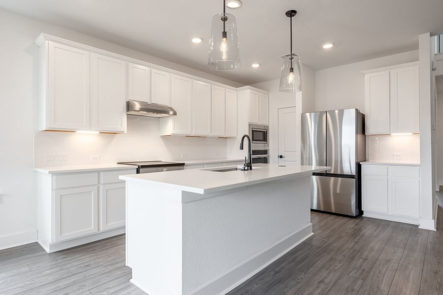 Furnished interior view inside a new home in Sage Collection – Freedom at Anthem, Kyle (Image 5).