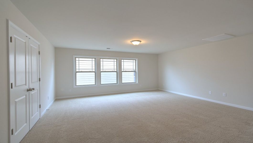 Spacious, unfurnished interior of a new home in Reserve at Tap Root Farms, Fletcher (Image 39).