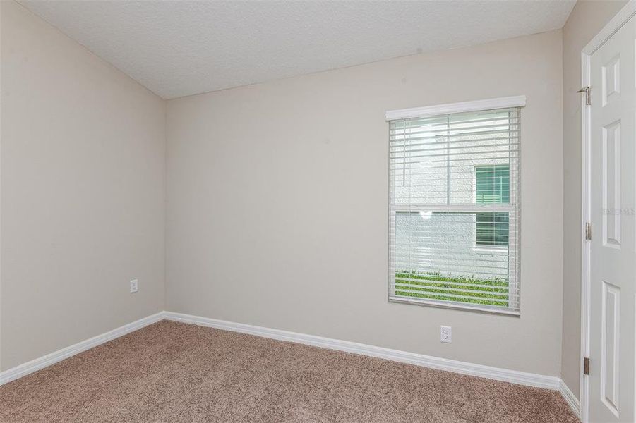 Spacious, unfurnished interior of a new home in Scenic Terrace, Haines City (Image 17).