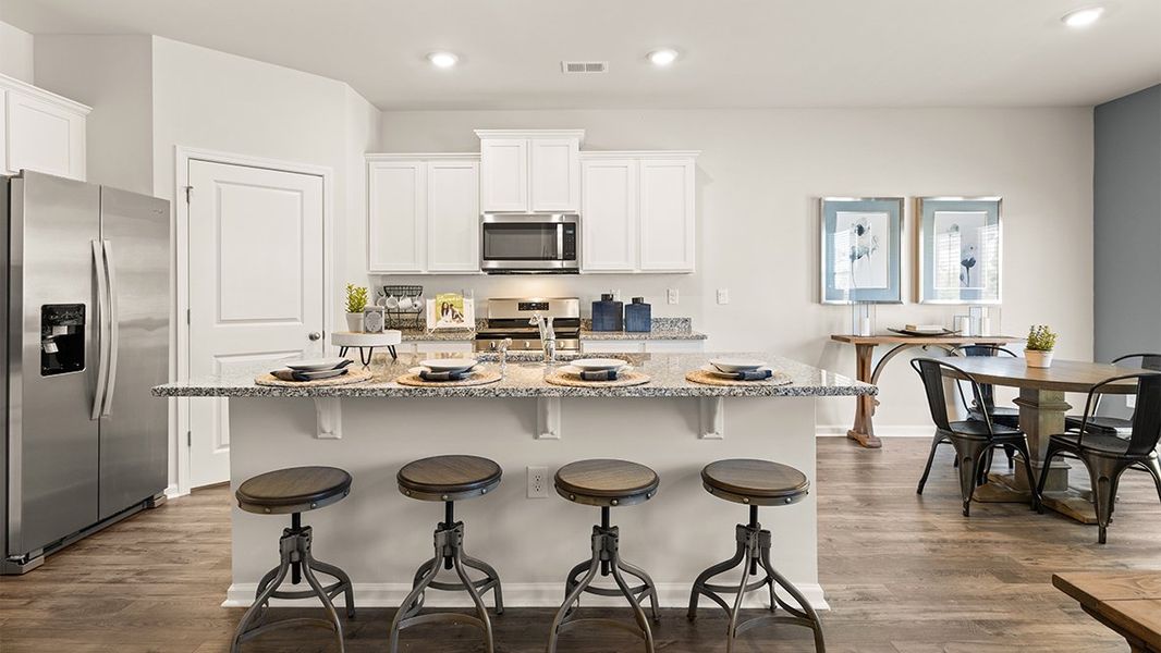 Representative furnished interior of a home built from the Elle by D.R. Horton in Highland Hills, Graniteville (Image 5). Representative furnished interior of a home built from the Elle by D.R. Horton in Highland Hills, Graniteville (Image 5).