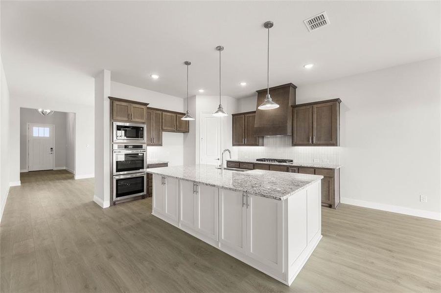 Furnished interior view inside a new home in Settler's Glen, New Fairview (Image 16).
