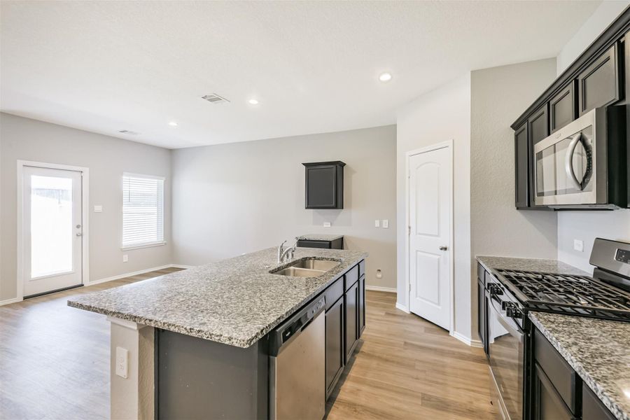 Furnished interior view inside a new home in Harrington Trails at The Canopies, New Caney (Image 7).