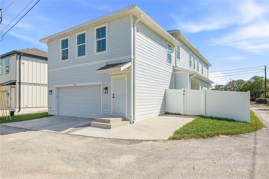 Front exterior of a new home in , St. Petersburg, FL, highlighting curb appeal (Image 25).