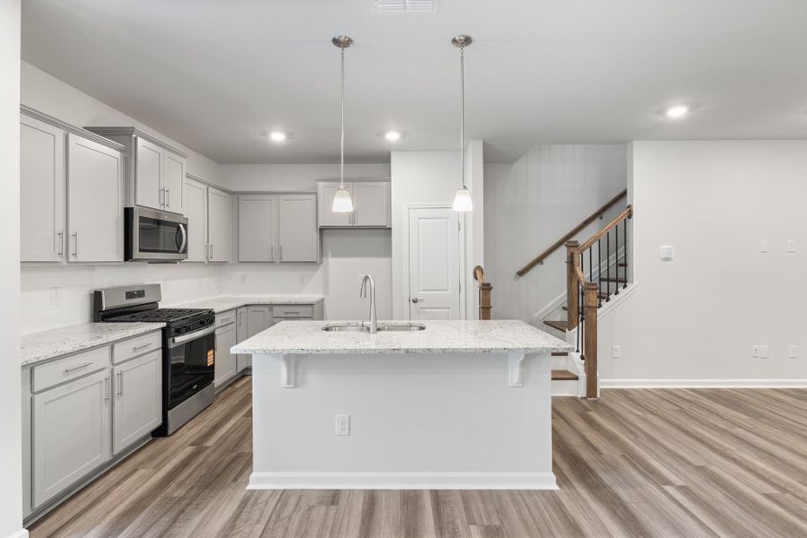 Furnished interior view inside a new home in Poets Walk, Whitsett (Image 7).