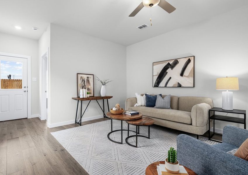 The family room is spacious and has plenty of room for furniture. The family room is spacious and has plenty of room for furniture.
