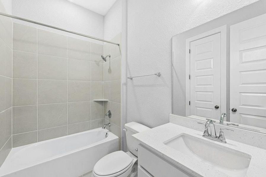 Furnished interior view inside a new home in The Colony, Bastrop (Image 11). Furnished interior view inside a new home in The Colony, Bastrop (Image 11).